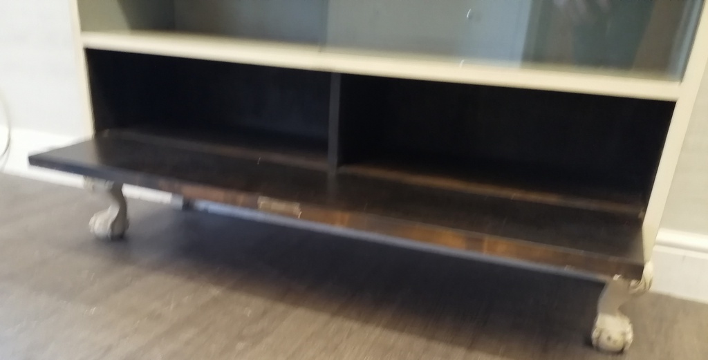 Glazed front sliding door painted bookcase