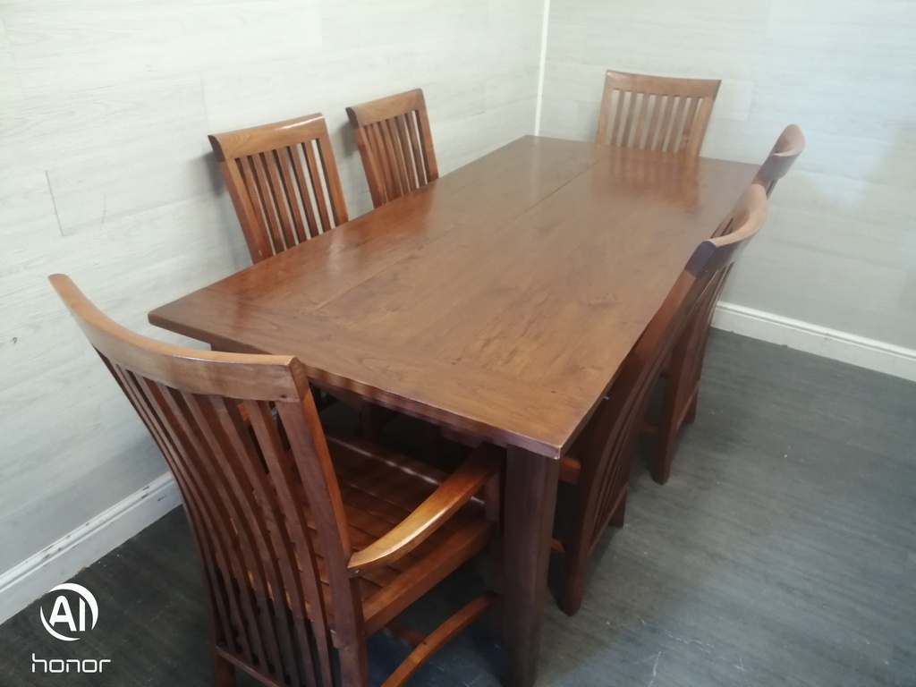 Lovely rustic dark wood table and six chairs