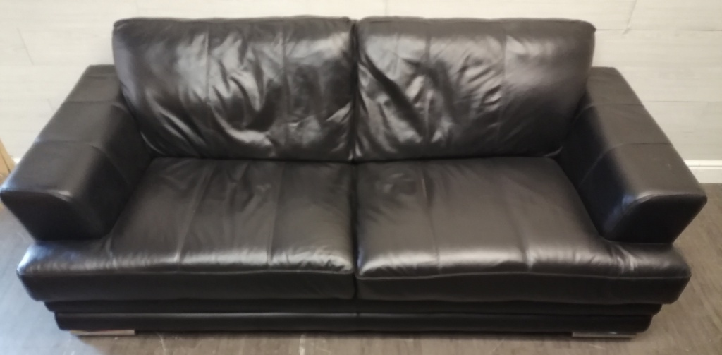 Quality black leather three seater sofa