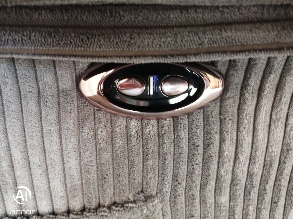 Grey electric recliner armchair