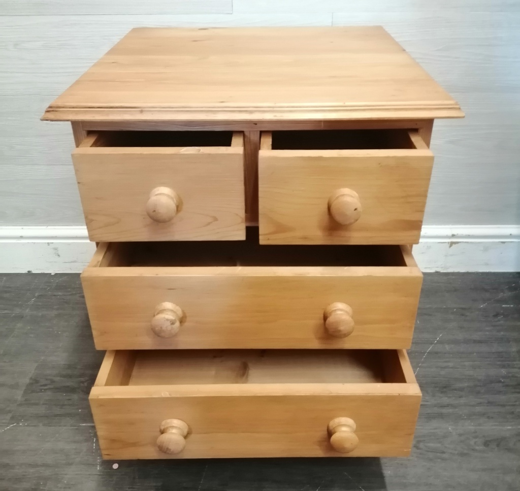 Quality solid pine four  drawer bedside chest