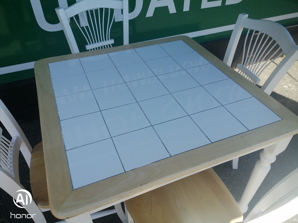 Neat Tile Top Table and Four Chairs