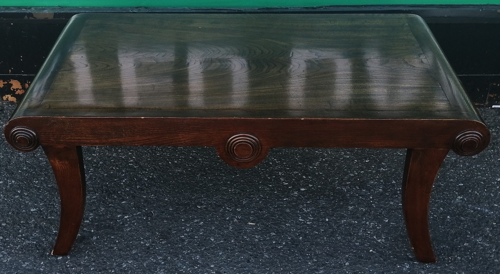 Dark wood scrolled coffee table