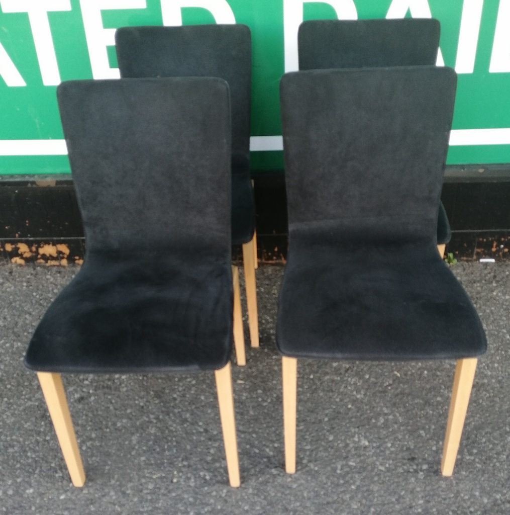 Set of four ligne roset black dining chairs